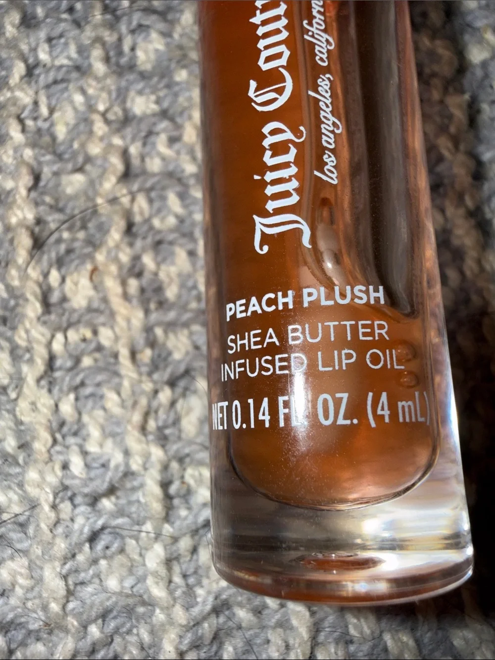 Juicy Couture Peach Plush Sheer Lip Oil in Peachy Orange